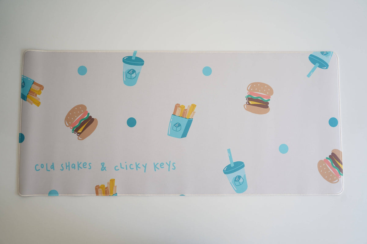 Close up of Cold Shakes & Clicky Keys Deskmats