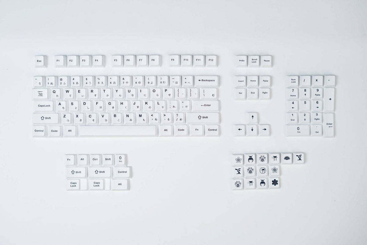 Black on White keycaps with japanese sub-legends, custom ordered by Keebsforall